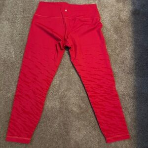 Lululemon leggings. 14. Gently used.Red. Lunar New Year Wunder Under. 25”
